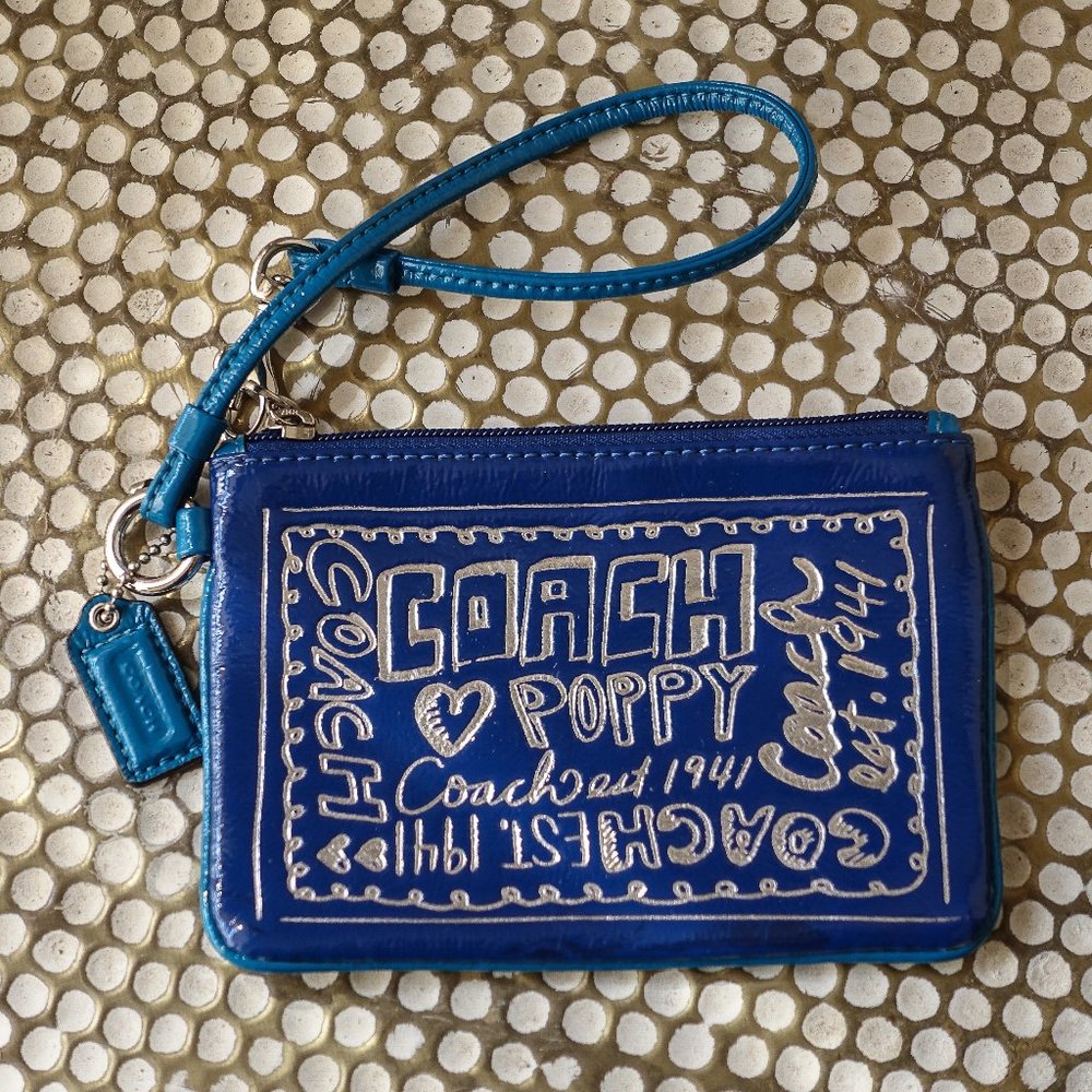 Coach Poppy Blue/Silver Print Embossed wristlet